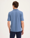 Back view of model wearing Coastal Fjord Pique Polo, Slim Fit.