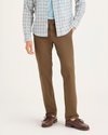 Front view of model wearing Coffee Liquer Men's Slim Fit Smart 360 Flex California Chino Pants.