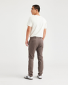 Back view of model wearing Coffee Quartz Men's Skinny Fit Original Chino Pants.
