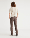 Back view of model wearing Coffee Quartz Men's Skinny Fit Smart 360 Flex California Chino Pants.