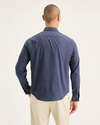 Back view of model wearing Crown Blue Men's Regular Fit Ultimate Shirt.