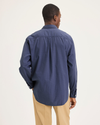 Back view of model wearing Crown Blue Men's Relaxed Fit Eighty-Six Shirt.