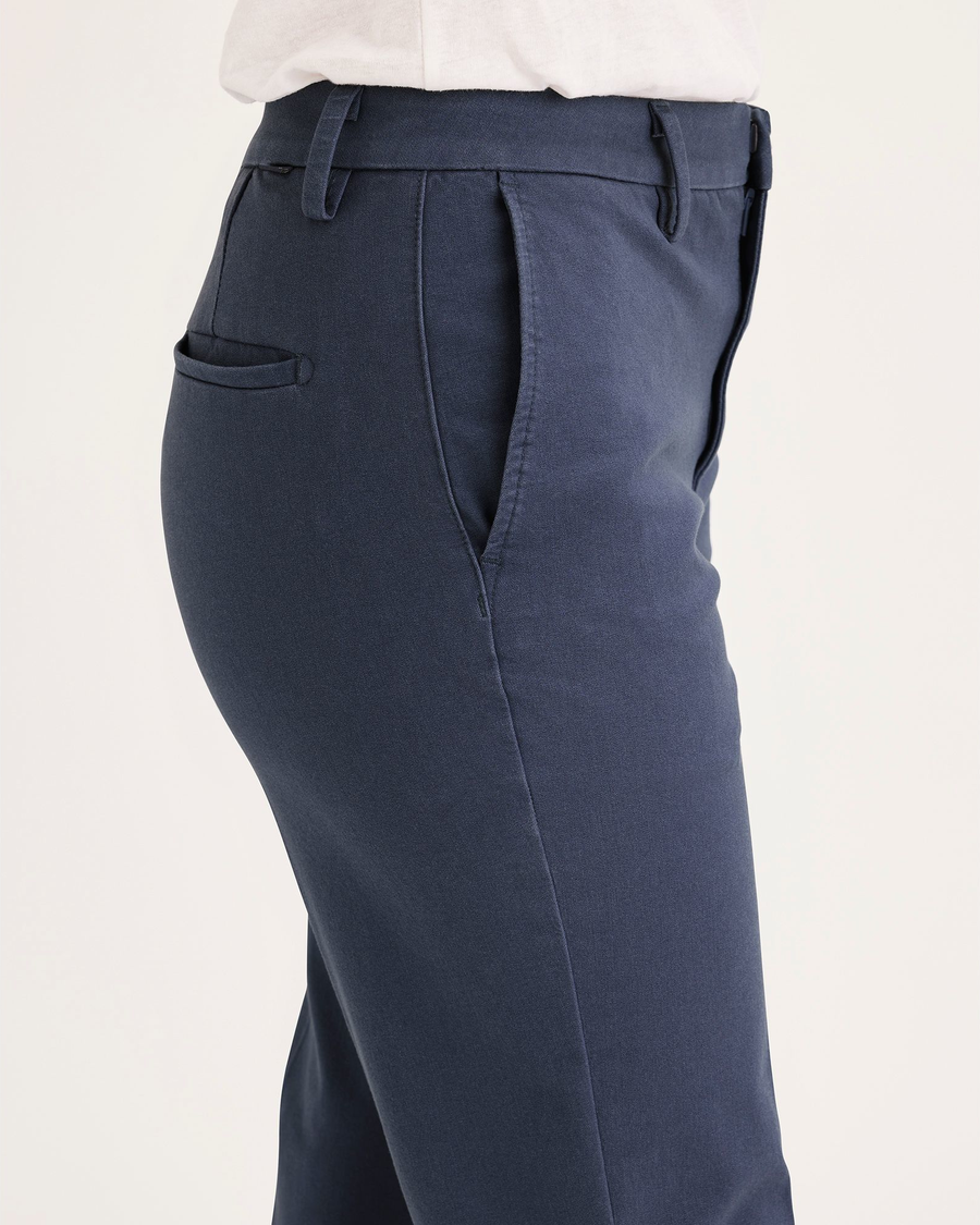 Side view of model wearing Crown Blue Women's Mid-Rise Slim Collins Trouser with Sculpt.