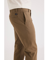 Side view of model wearing Cub Alpha Chino Pants, Slim Fit.