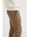 Side view of model wearing Cub Men's Skinny Fit Original Chino Pants.