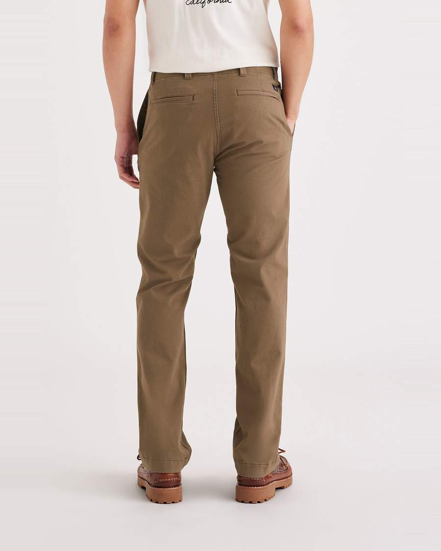 Back view of model wearing Cub Men's Slim Fit Smart 360 Flex California Chino Pants.