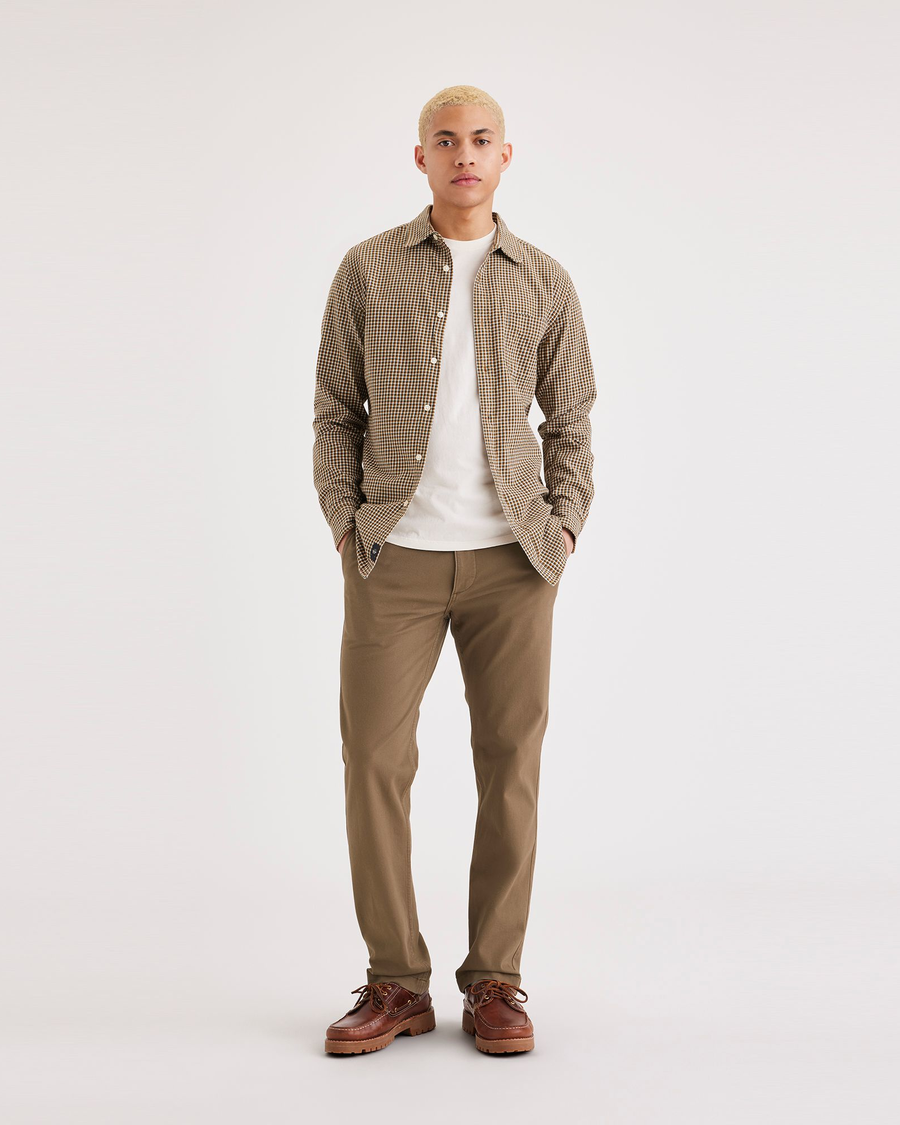 Front view of model wearing Cub Men's Slim Fit Smart 360 Flex California Chino Pants.