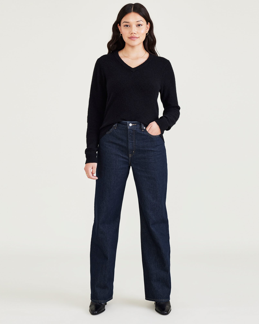 Front view of model wearing Dark Indigo Stonewash Women's Relaxed Fit Mid-Rise Jeans.