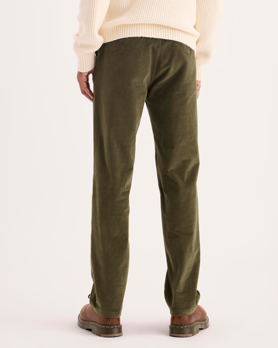 Back view of model wearing Dark Moss Ultimate Chino Pants with Smart 360 Flex™, Slim Fit.