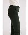 Side view of model wearing Deep Forest Women's Skinny Fit Chino Pants.