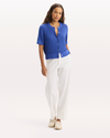 View of model wearing Deep Ultramarine Short Sleeve Cardigan, Regular Fit.