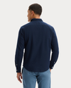 Back view of model wearing Dobby Navy Blazer Ultimate Shirt, Regular Fit.