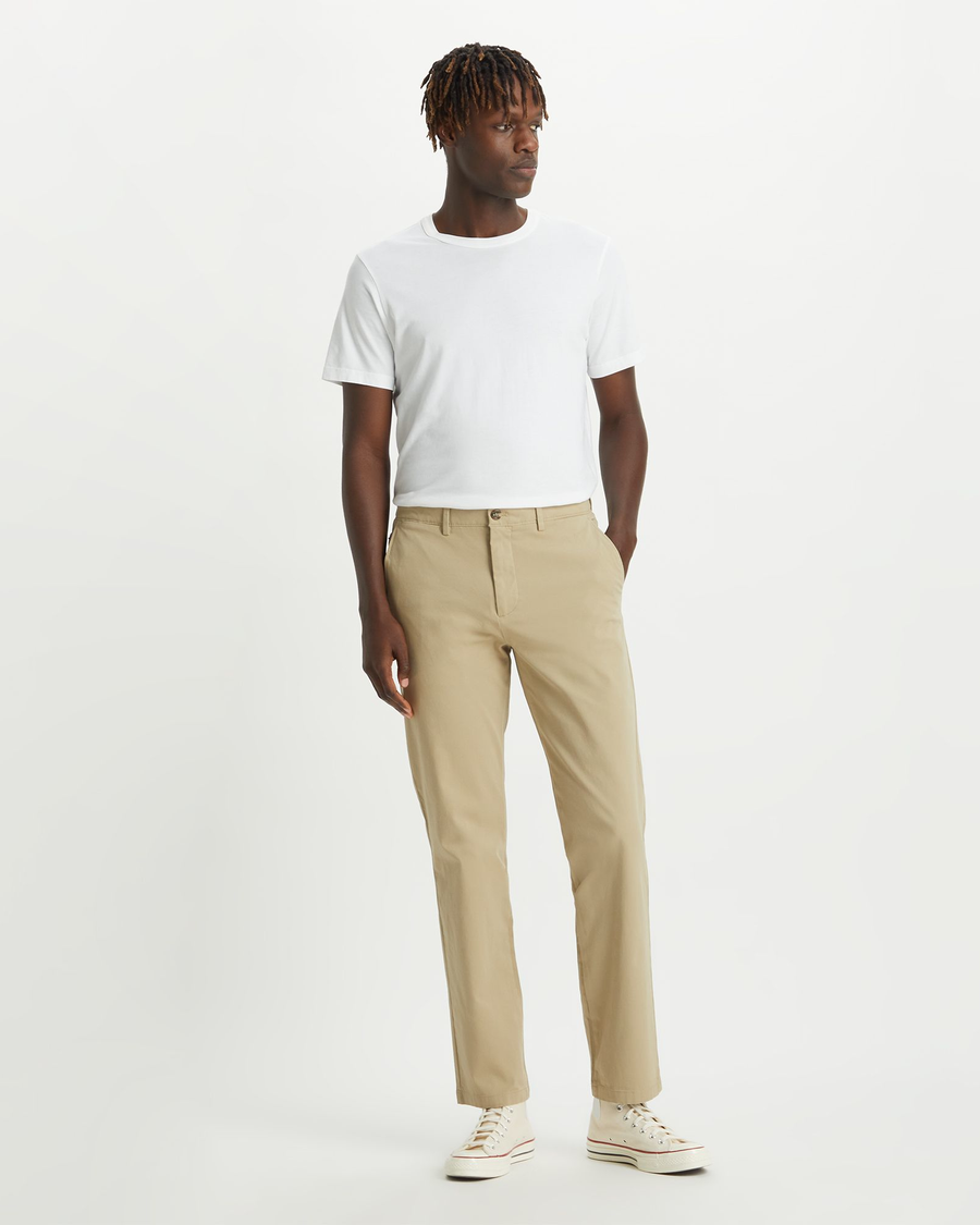 Front view of model wearing Dockers Khaki Crafted Khaki Pants, Slim Fit.