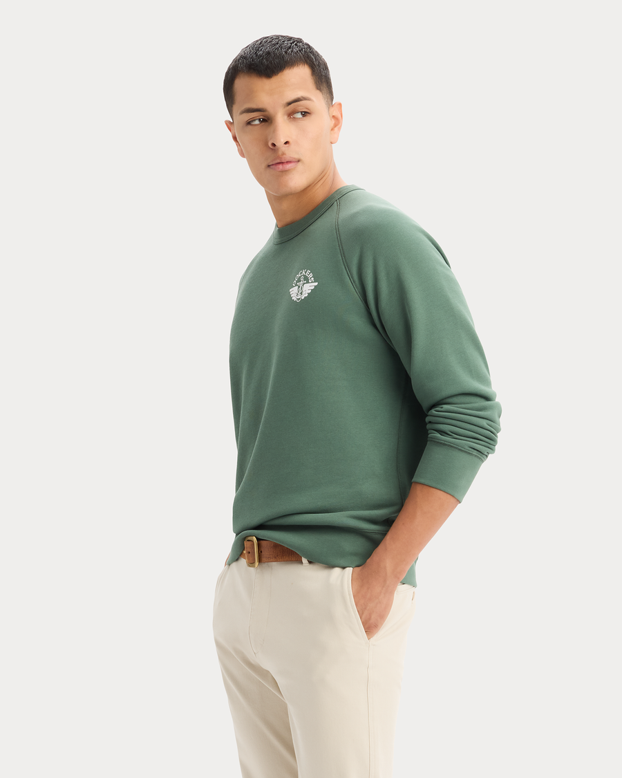 View of model wearing Duck Green Icon Crewneck Sweatshirt, Regular Fit.