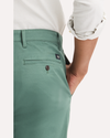 View of model wearing Duck Green Original Chino Pants, Slim Fit.