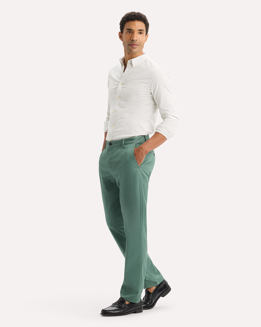 View of model wearing Duck Green Original Chino Pants, Slim Fit.