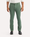 Front view of model wearing Duck Green Ultimate Chinos, Skinny Fit.