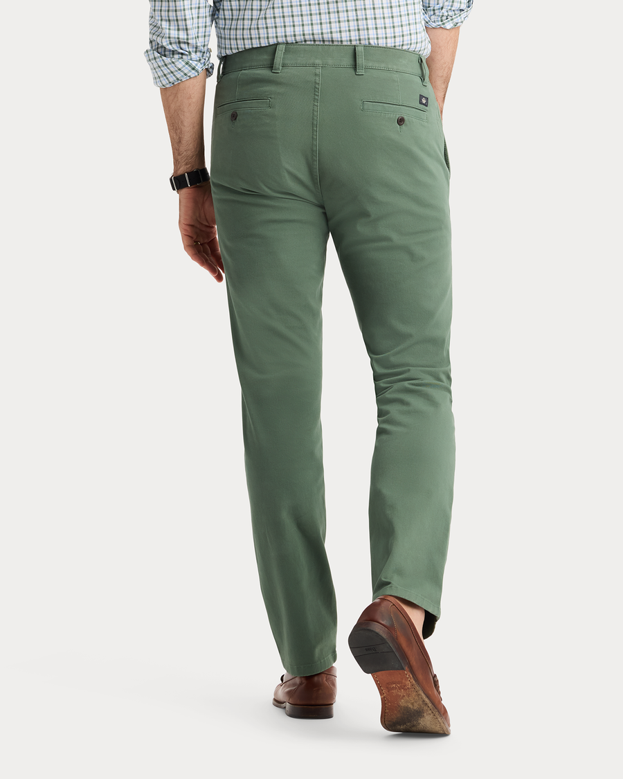 View of model wearing Duck Green Ultimate Chinos, Slim Fit.