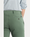 View of model wearing Duck Green Ultimate Chinos, Slim Fit.