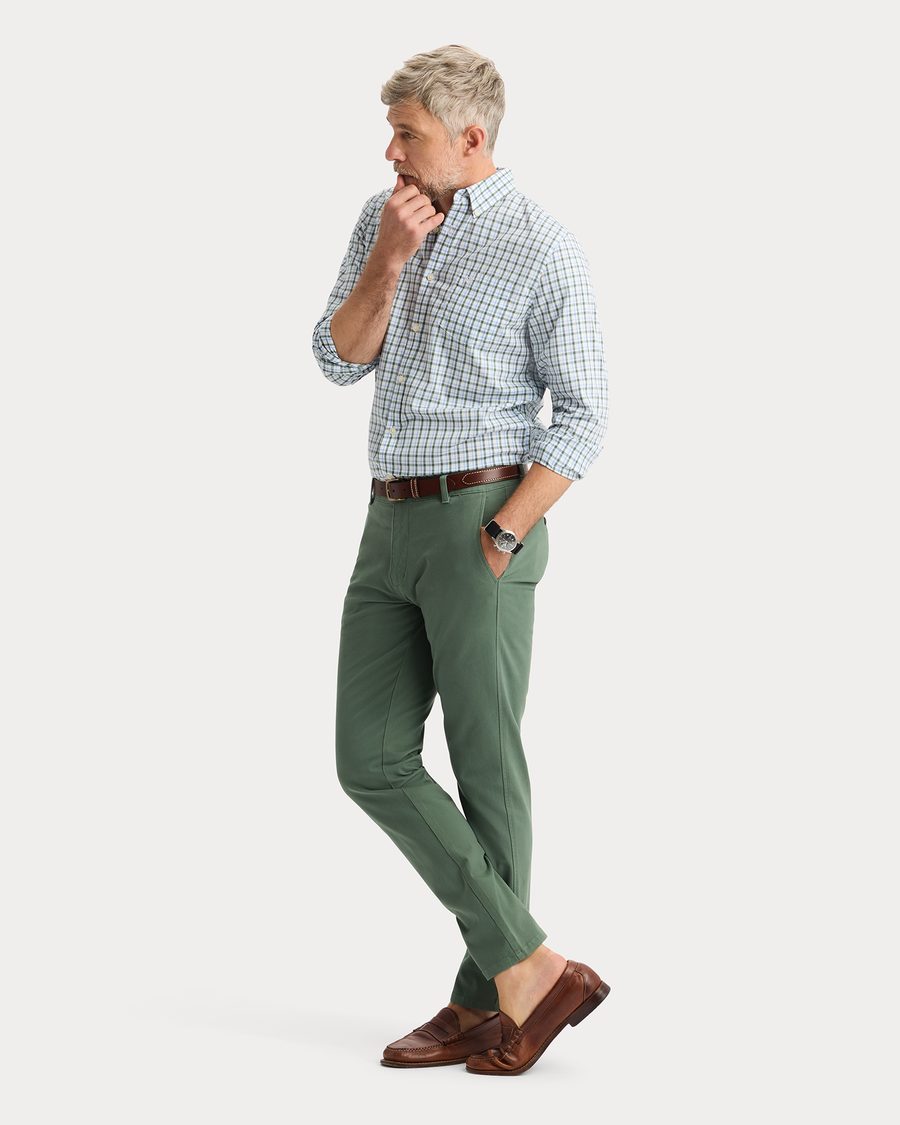 View of model wearing Duck Green Ultimate Chinos, Slim Fit.