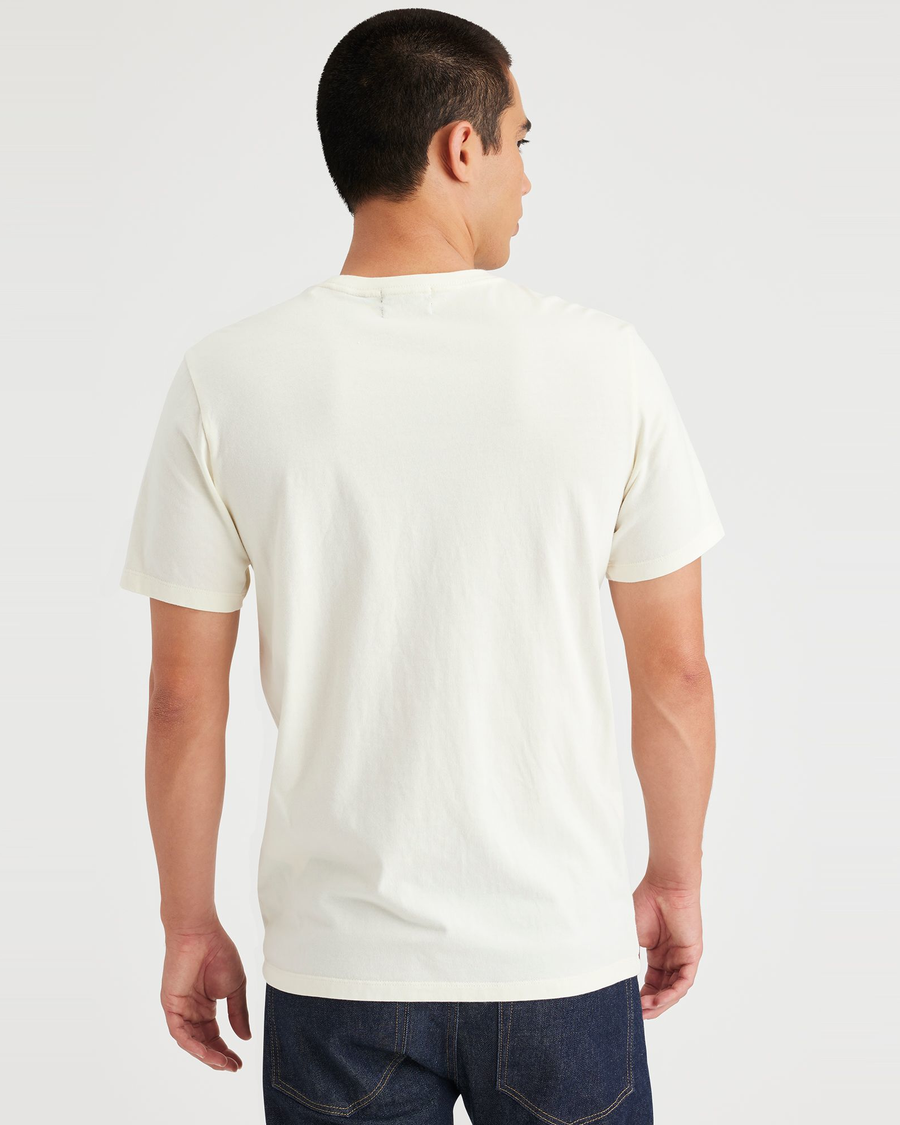 Back view of model wearing Egret Men's Slim Fit Logo Tee.