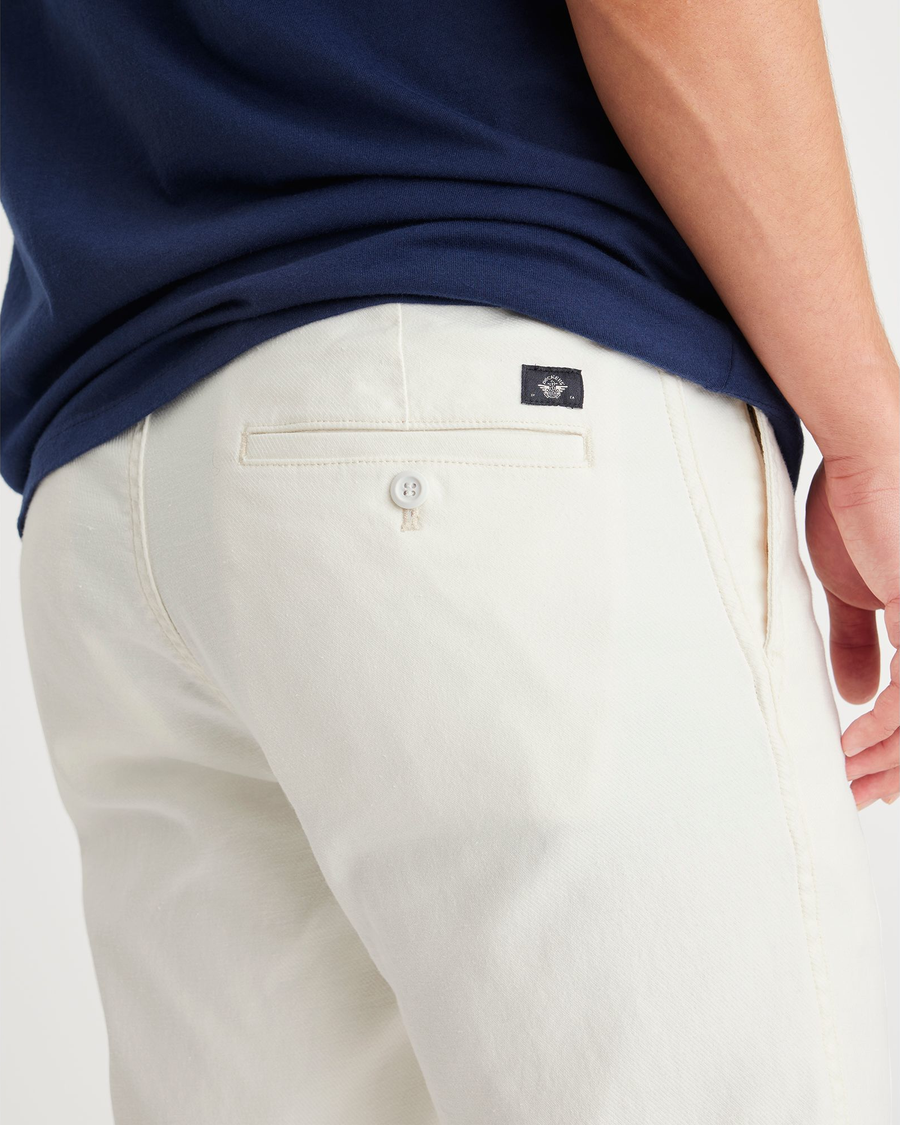 View of model wearing Egret Men's Slim Fit Original Chino Pants.