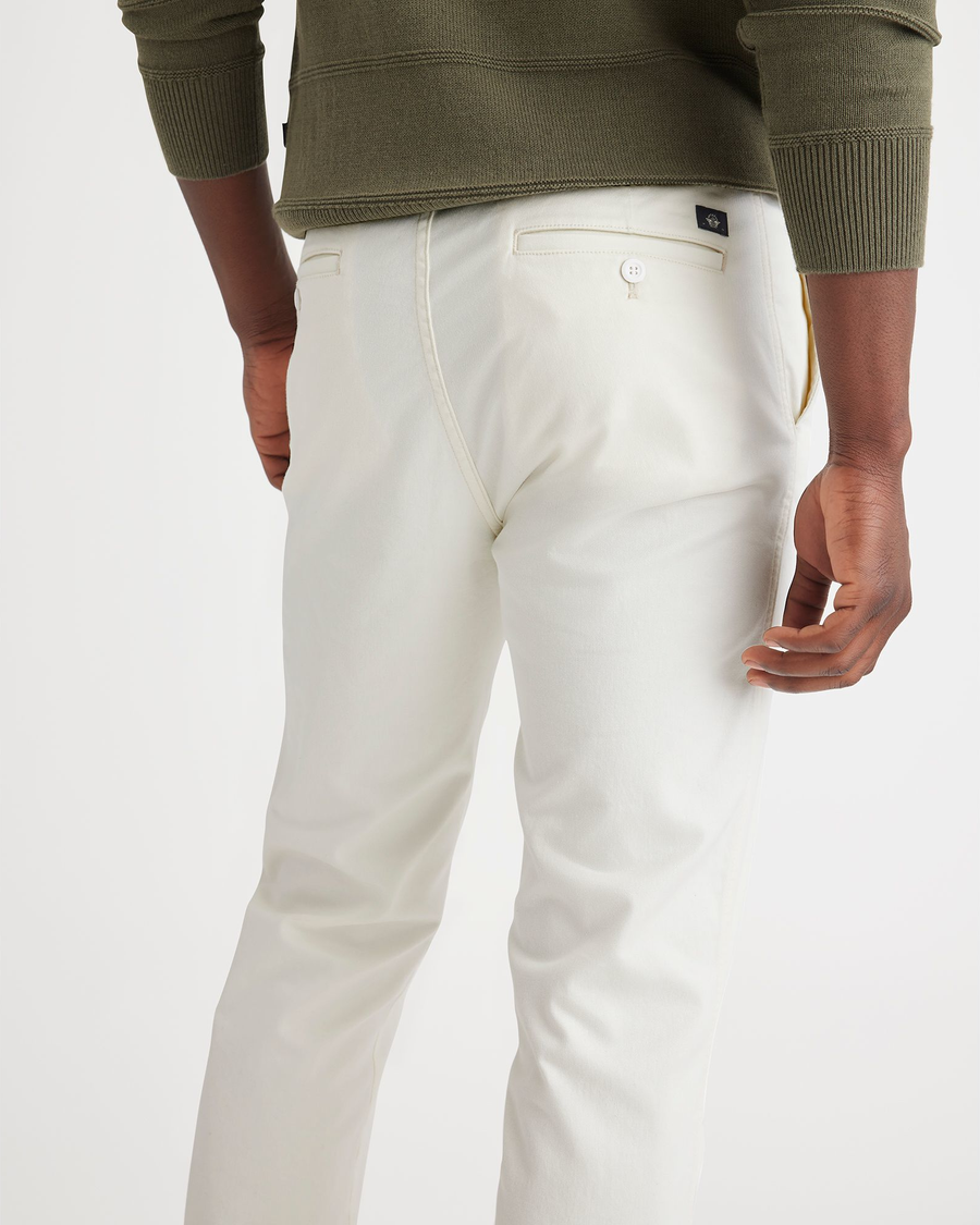 View of model wearing Egret Men's Slim Fit Original Chino Pants.