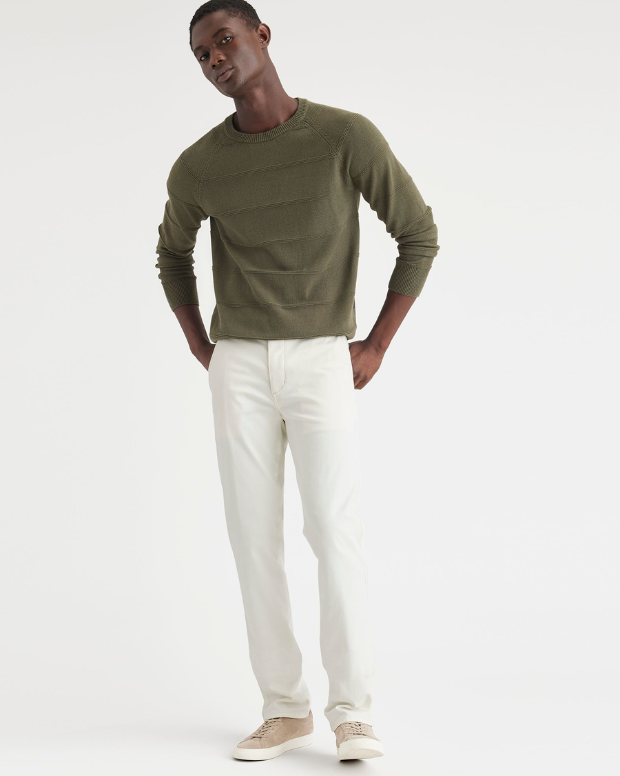 View of model wearing Egret Men's Slim Fit Original Chino Pants.