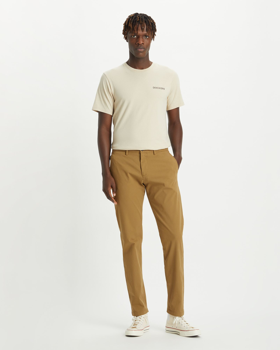 Front view of model wearing Ermine Men's Slim Tapered Fit Smart 360 Flex Alpha Chino Pants.