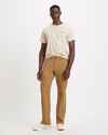 Front view of model wearing Ermine Men's Straight Fit Smart 360 Flex Alpha Chino Pants.