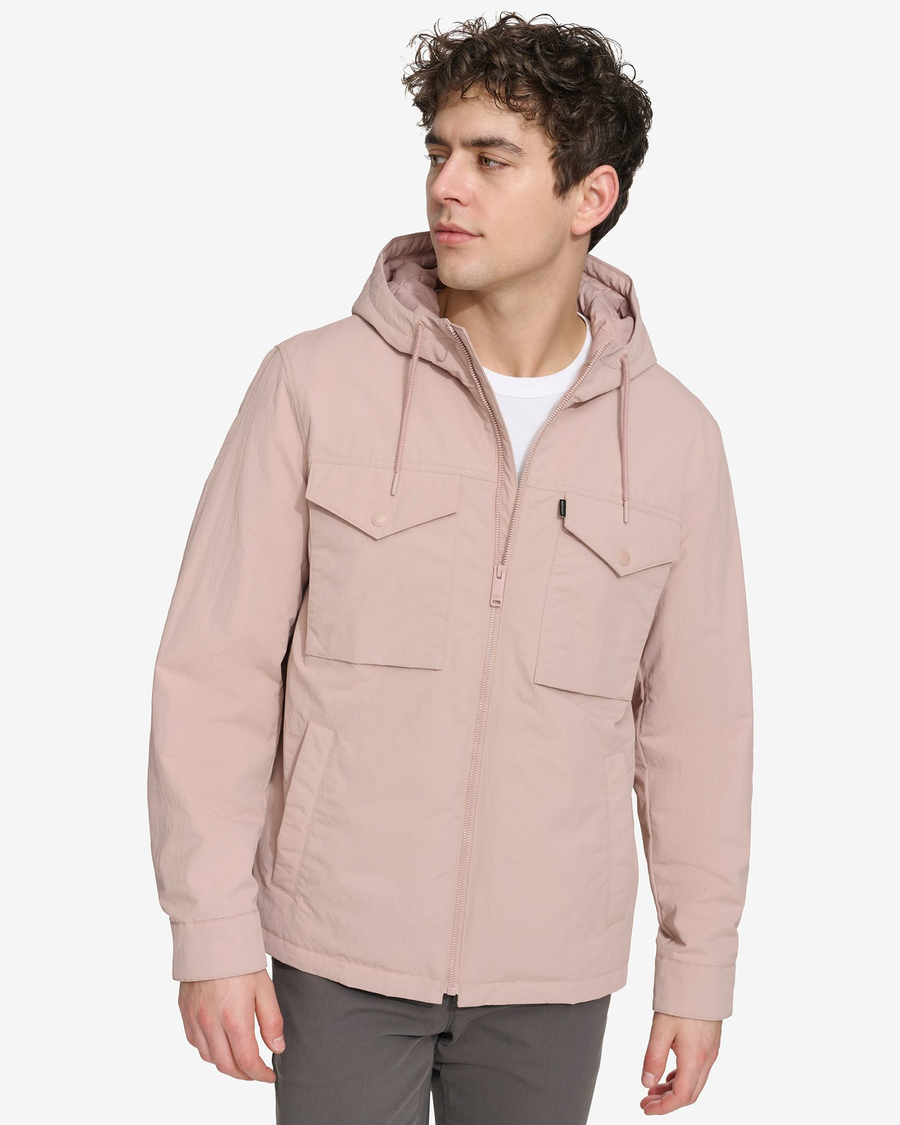 Front view of model wearing Fawn Men's Sail Recycled Nylon Jacket.
