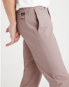 View of model wearing Fawn Men's Skinny Fit Smart 360 Flex California Chino Pants.