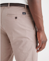 View of model wearing Fawn Men's Slim Fit Original Chino Pants.