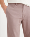 View of model wearing Fawn Men's Slim Fit Smart 360 Flex California Chino Pants.