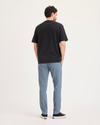 Back view of model wearing Folkstone Gray Ultimate Chino Pants with Smart 360 Flex™, Skinny Fit.