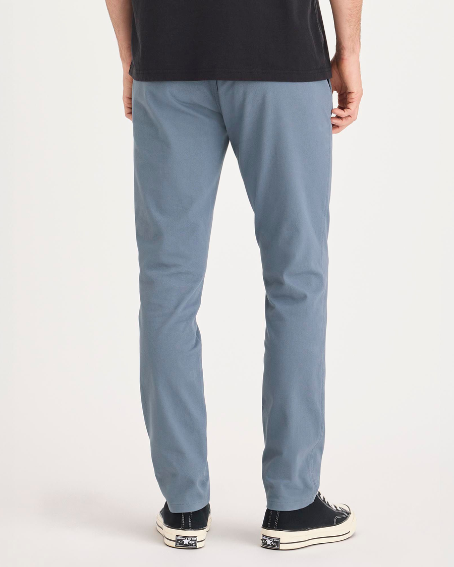 Back view of model wearing Folkstone Gray Ultimate Chino Pants with Smart 360 Flex™, Skinny Fit.