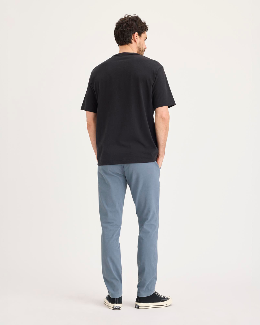 Back view of model wearing Folkstone Gray Ultimate Chino Pants with Smart 360 Flex™, Skinny Fit.