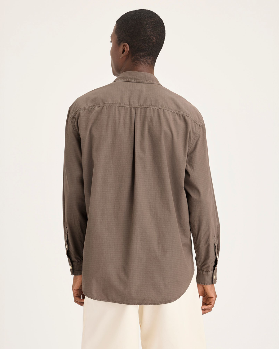 Back view of model wearing Fossil Garment Dye Men's Relaxed Fit Eighty-Six Shirt.