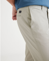 View of model wearing Grit Men's Skinny Fit Smart 360 Flex California Chino Pants.