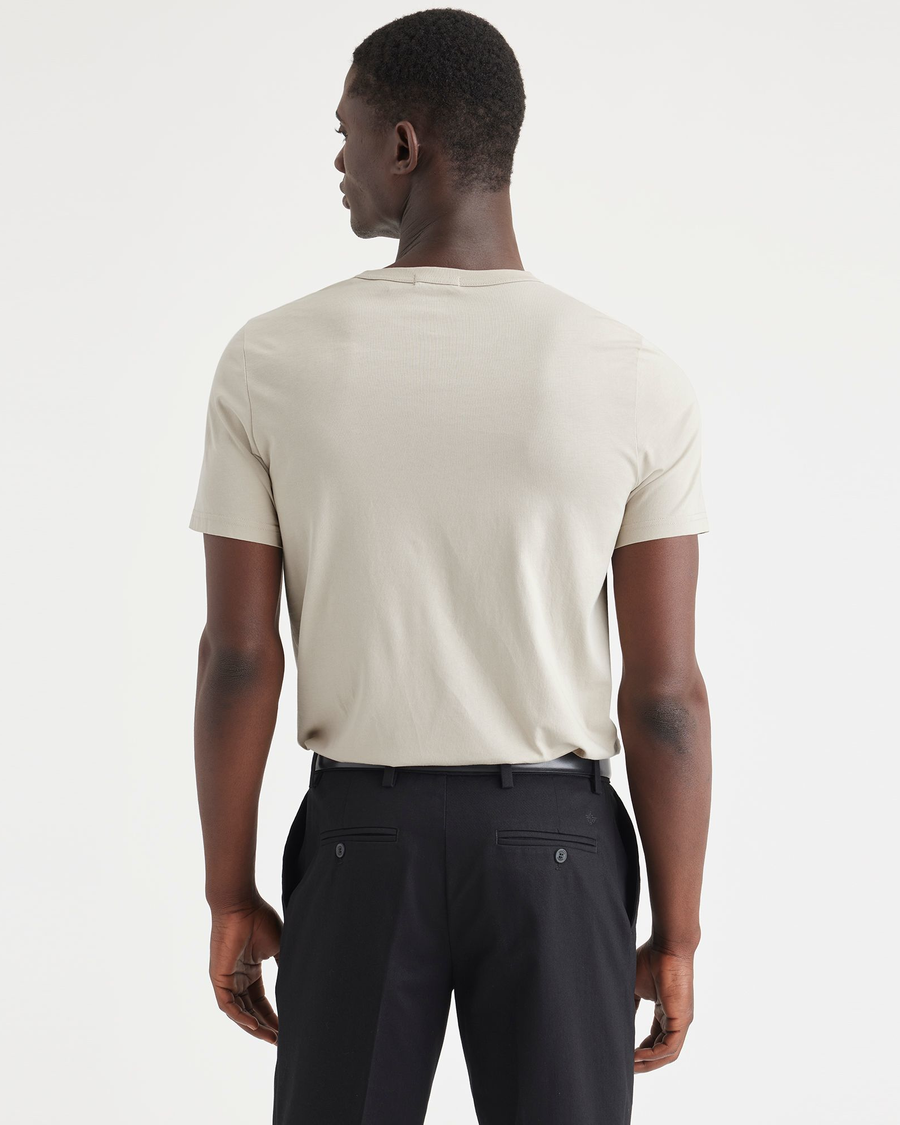 Back view of model wearing Grit Men's Slim Fit Icon Tee Shirt.