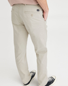 View of model wearing Grit Men's Slim Fit Original Chino Pants.