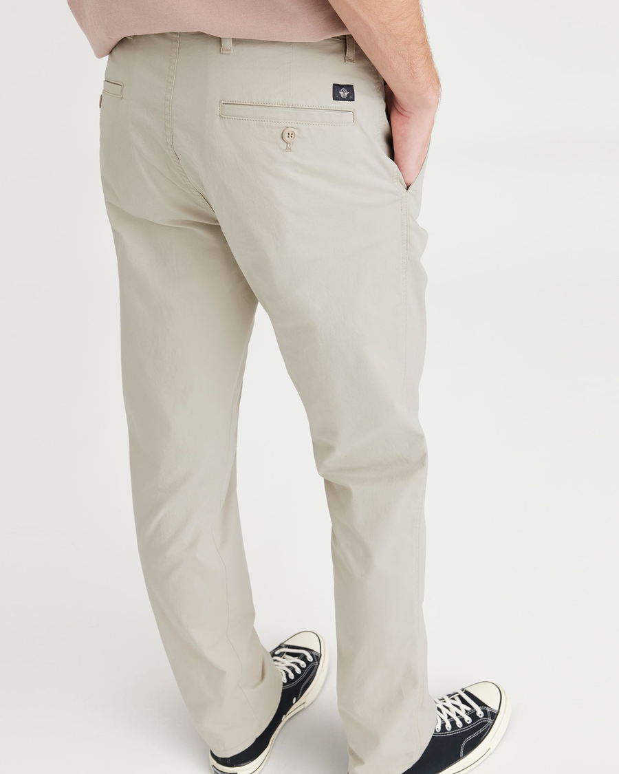 View of model wearing Grit Men's Slim Fit Original Chino Pants.