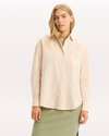 Front view of model wearing Hansen Peach Blush Relaxed Shirt.
