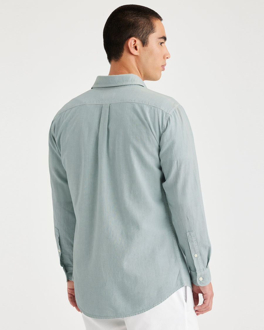 Back view of model wearing Harbor Gray Men's Slim Fit Icon Button Up Shirt.