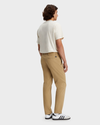 Back view of model wearing Harvest Gold Alpha Chino Pants, Straight Fit.