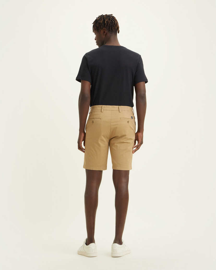 Back view of model wearing Harvest Gold Big and Tall Supreme Flex Modern Chino Shorts.