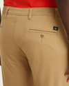 View of model wearing Harvest Gold Big and Tall Tapered Fit Supreme Flex Pants.