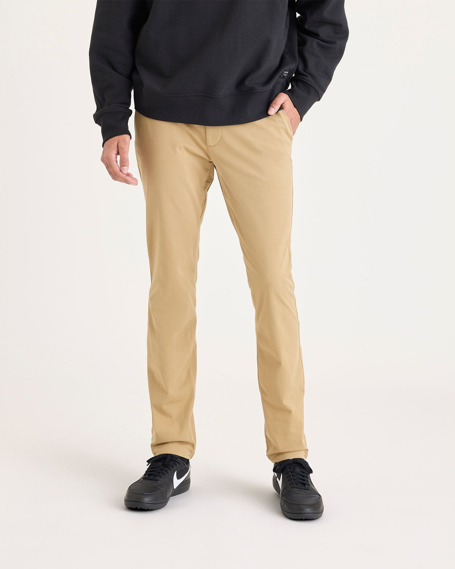 Front view of model wearing Harvest Gold Chino Go Activeflex, fit skinny.