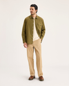 View of model wearing Harvest Gold Eighty-Six Alpha Chino Pants, Loose Fit.