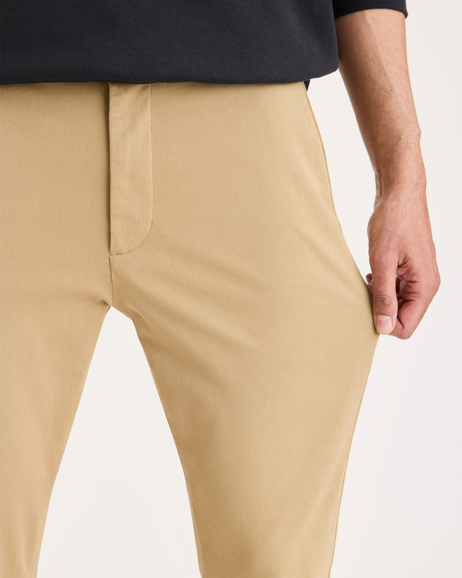 View of model wearing Harvest Gold Go Activeflex Chino, Skinny Fit.